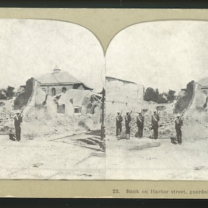 Stereoview - 1907 Earthquake Damage - Kingston, Jamaica. Bank on Harbor Street Guarded by Native Soldiers.