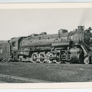 RpPC Railroad Cartolina fotografica. Chicago e Illinois Midland Railway 702. Taylorville, Illinois 1947. Robert J. Foster.