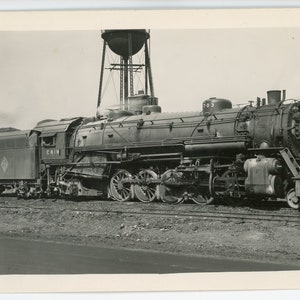 Carte postale photo rpPC Railroad. Chicago and Illinois Midland Railway 703. Taylorville, Illinois 1946. Robert J. Foster.