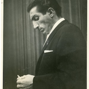 Vintage Black & White Headshot Photo for Actor, Tony Cesare. Holding Cigarette.