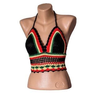 May include: A black crochet halter top with red, yellow, and green stripes. The top is crocheted in a fine mesh pattern and has a scalloped hem.