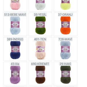 May include: A grid of yarn skeins in various colors, including beige, pink, blue, green, orange, brown, and purple. Each skein has a label with a number and a color name in Turkish.