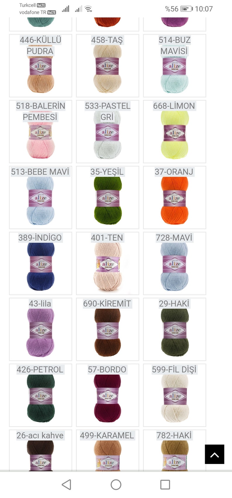 May include: A grid of yarn skeins in various colors, including beige, pink, blue, green, orange, brown, and purple. Each skein has a label with a number and a color name in Turkish.