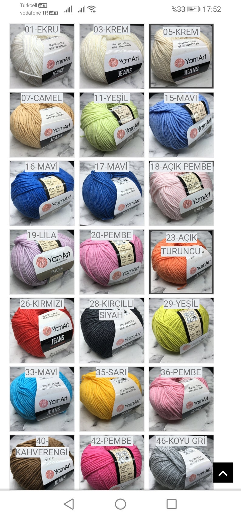 May include: A collection of 12 yarn balls in various colors, including white, cream, beige, light green, light blue, blue, lilac, pink, orange, red, yellow, and gray. Each ball is labeled with a number and a color name in Turkish. The yarn is labeled "YarnArt Jeans".