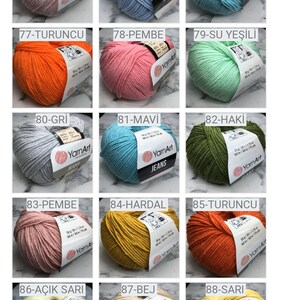 May include: A collection of yarn balls in various colours, including beige, purple, light pink, light blue, orange, pink, light green, grey, turquoise, green, peach, yellow, cream, yellow, light purple, red, and burgundy. Each ball has a label with a number and a colour name in Turkish.