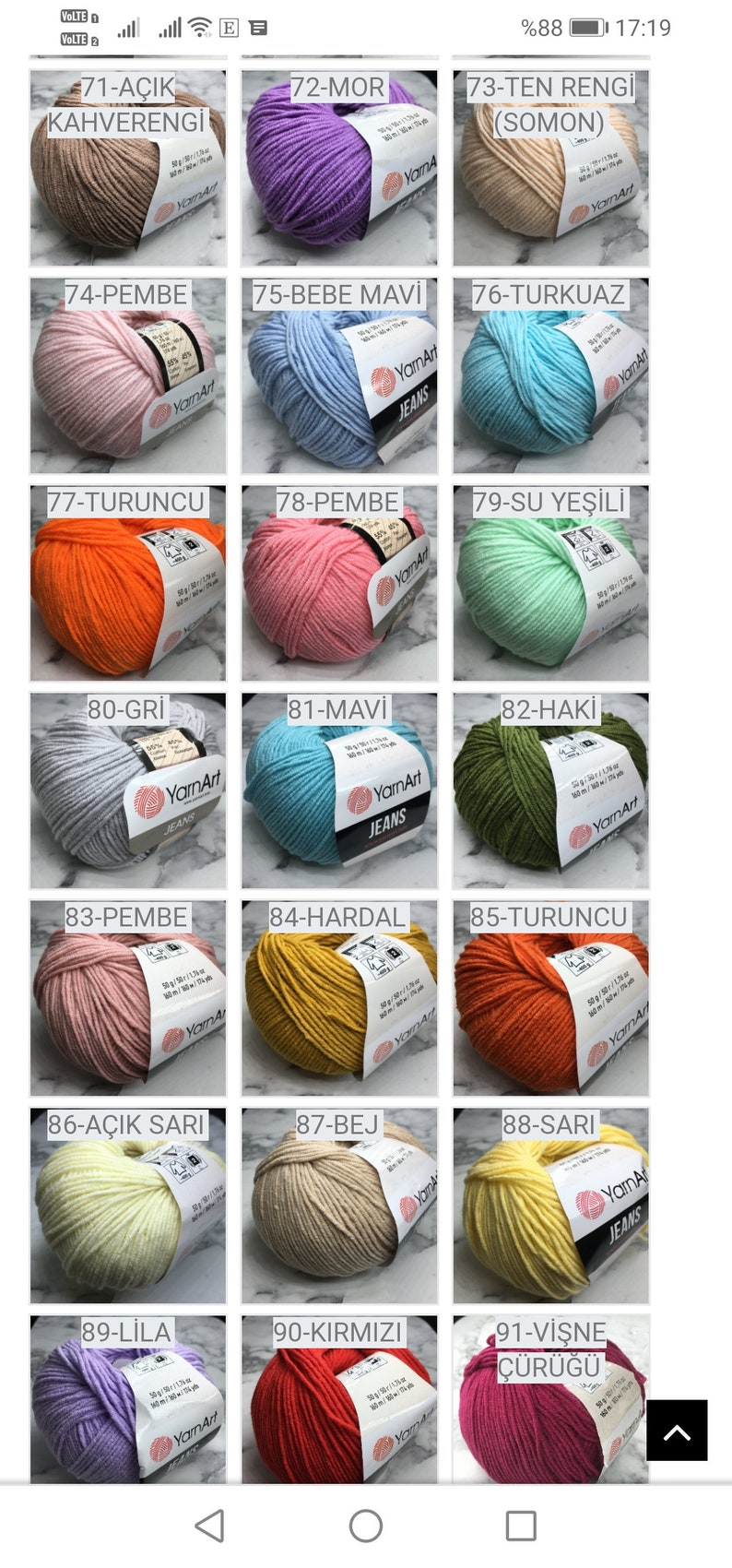 May include: A collection of yarn balls in various colours, including beige, purple, light pink, light blue, orange, pink, light green, grey, turquoise, green, peach, yellow, cream, yellow, light purple, red, and burgundy. Each ball has a label with a number and a colour name in Turkish.