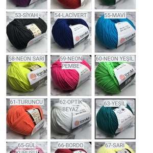 May include: A collection of yarn balls in various colours, including blue, beige, purple, red, black, green, yellow, orange, white, pink, teal, brown, and grey. Each ball has a label with a number and a colour name in Turkish.