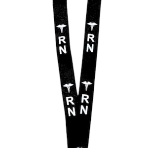 May include: Black lanyard with a silver clip and the text "RN" repeated with a medical symbol on each side.