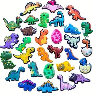 May include: A set of 25 colorful dinosaur-shaped magnets, including a variety of dinosaurs, eggs, and a pterodactyl. The magnets are made of a soft, flexible material and are perfect for decorating a refrigerator or other metal surface.