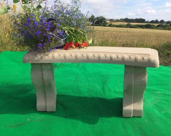 Cast stone curved bench