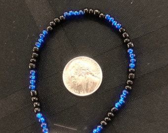 Blue and black glass beaded bracelet