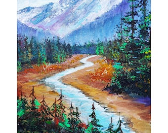 May include: An oil painting on canvas depicting a winding light blue river flowing through a valley. The landscape features dark green pine trees, golden-brown foliage, and snow-capped purple mountains in the distance. Signed Tanya Hubo 2023.