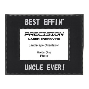 May include: Black leather picture frame with white stitching. The frame has the text "BEST EFFIN' UNCLE EVER!" and "PRECISION LASER ENGRAVING" in white. The frame is landscape orientation and holds one photo.