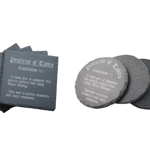 May include: Set of four black slate coasters with a white inscription that reads "Protector of Tables, Constitution +2. A handy piece of equipment that protects surfaces from taking water damage. Also used to prevent encounters with angry companions."