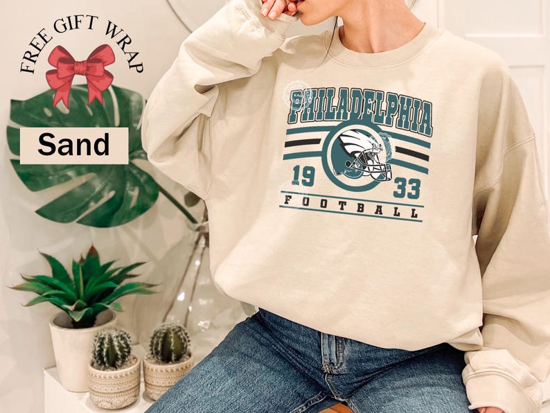 Philadelphia football sweatshirt designed with a classic unisex crewneck fit, ideal for Sunday football games, tailgating, or cozy fall weekends. This stylish and comfortable sweater is perfect for men, women, and kids who love showing Philadelphia team pride. Great sports apparel for football season, and a thoughtful gift idea for fans of all ages looking for quality game day clothing.