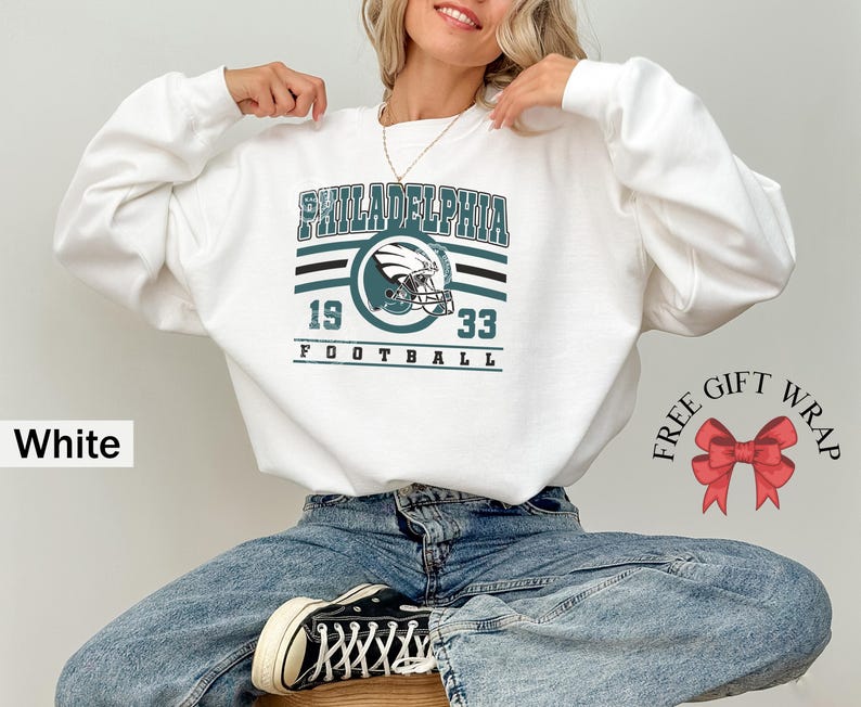Philadelphia football sweatshirt designed with a classic unisex crewneck fit, ideal for Sunday football games, tailgating, or cozy fall weekends. This stylish and comfortable sweater is perfect for men, women, and kids who love showing Philadelphia team pride. Great sports apparel for football season, and a thoughtful gift idea for fans of all ages looking for quality game day clothing.