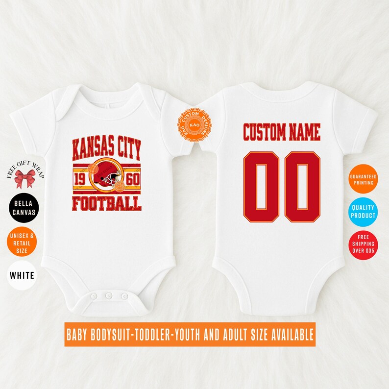 May include: White baby bodysuit with a red and gold Kansas City Football design on the front. The back features a red number "00" with a gold outline. The text "Custom Name" is above the number. Available in baby, toddler, youth, and adult sizes.