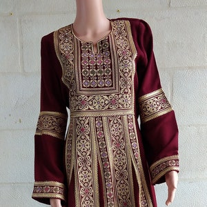 Palestinian Thobe Tatreez Dress Maxi Burgundy with golden embroidery.