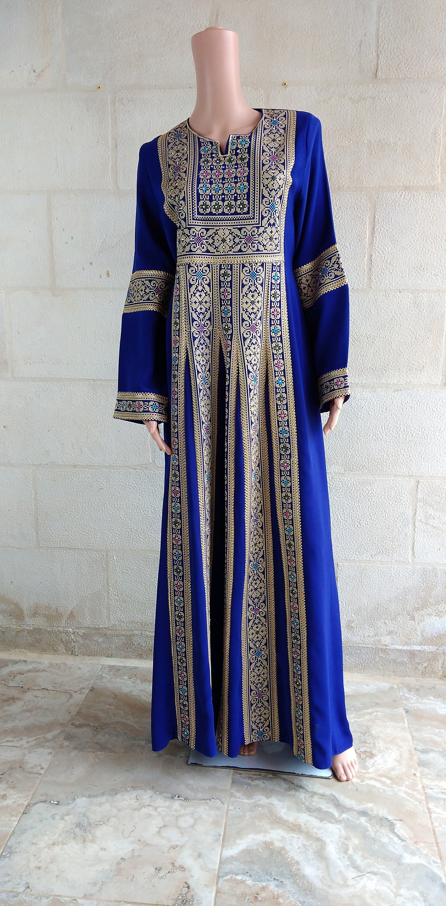 Palestinian Thobe Tatreez Dress Maxi Blue with golden embroidery.