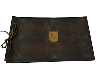 Álbum de fotos antigo colonial Eastman Kodak com relevo preto, década de 1920, em excelente estado de conservação. Estilo gótico.