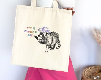 Yall Means All Raccoon Tote Bag Trash Panda Cowgirl Tote Cowboy Tote LGBTQ Tote Bag Gay Pride Lesbian Pride Bi Pride Tote Bag Cotton Tote