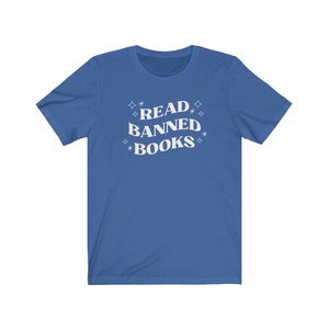 May include: A royal blue t-shirt with the text "READ BANNED BOOKS" in white with stars around the text.