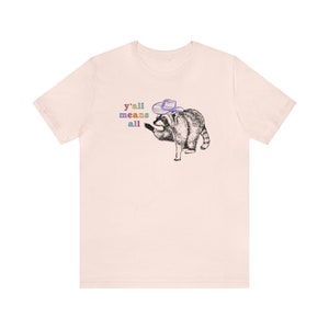Yall Means All Raccoon Shirt Cowgirl Shirt Cowboy Shirt Western Graphic Tee Trash Panda Raccoon Gifts Pride Shirt Human Rights Shirt Gay Soft Pink