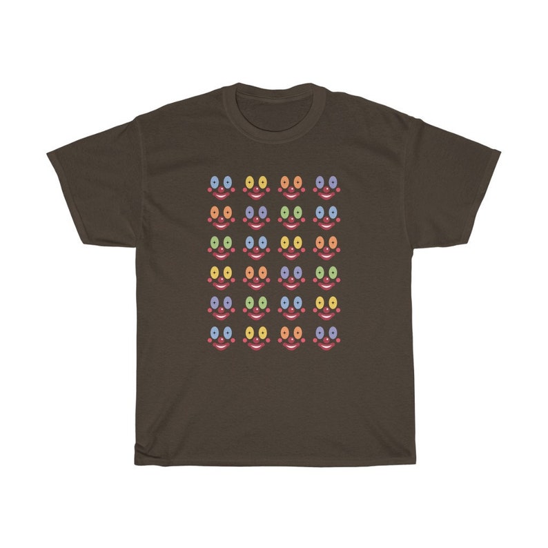 May include: A brown t-shirt with a pattern of colorful clown faces. Each face has a red nose, blue mouth, and rainbow colored eyes.
