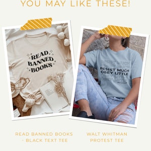 May include: Two t-shirts with different designs. The first t-shirt is beige with black text that reads "Read Banned Books". The second t-shirt is light blue with black text that reads "Resist Much, Resist Much, Resist Much, Obey Little, Obey Little, Obey Little - Walt Whitman".