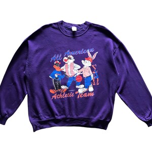 Vintage anni '90 Warner Bros x American Sportswear All American Athletic Team / Gators / Sigma Delta Omega Cartoon felpa girocollo taglia XXL