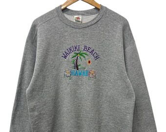Vintage 90s Waikiki Beach Hawaii embroidery spellout fruit of the loom tag crewneck sweatshirt L size