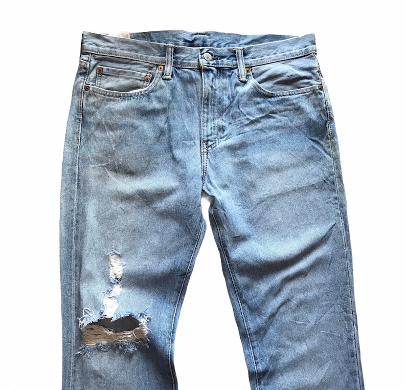 511 distressed jeans