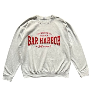 May include: A gray sweatshirt with a red embroidered logo that says "Authentic Bar Harbor Maine" with three stars above the text.