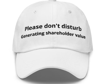 May include: White baseball cap with the text "Please don't disturb Generating shareholder value" in black. The cap has a curved brim and a button on top. A casual accessory for everyday wear.