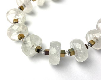 Beautiful cut rock crystal necklace with gold cube and Swarovski crystal and silver hook closure