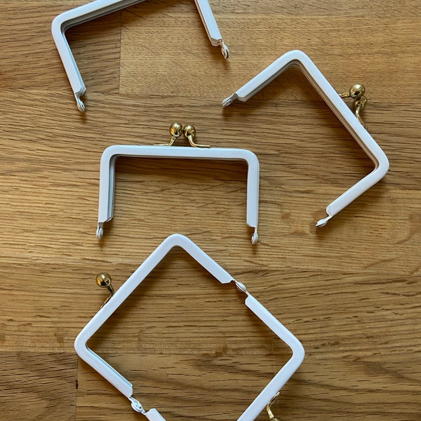 White / gold metal bag frames