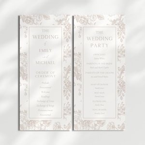 May include: Two wedding program cards with floral designs. The left card reads "The Wedding of Emily and Michael" and lists the order of ceremony. The right card lists the wedding party, including the officiant, parents, and attendants.