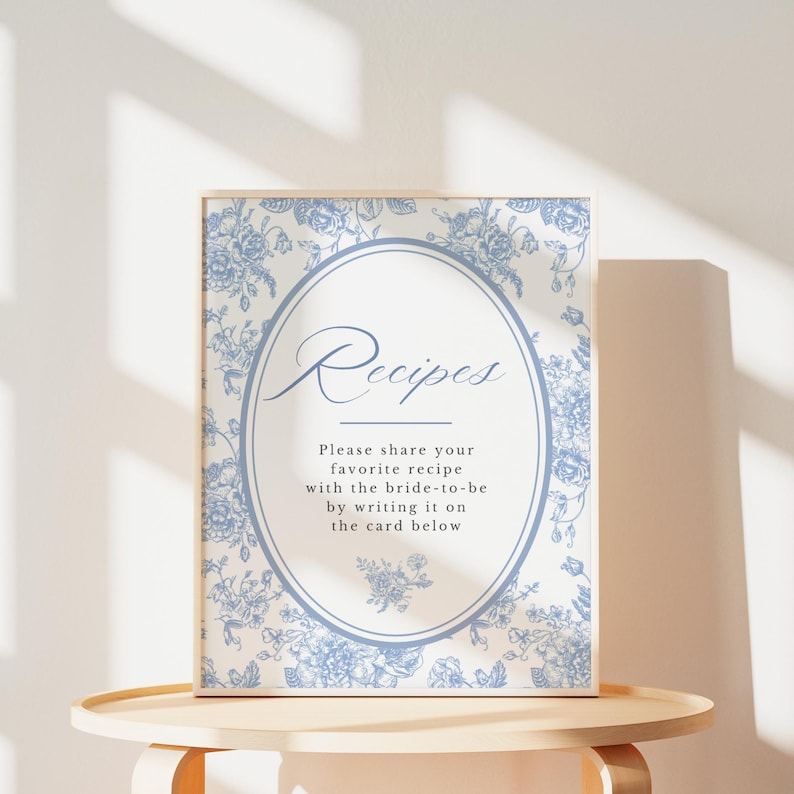 Elegant blue toile bridal shower recipe card bundle with matching printable sign and rhyming insert card displayed on vintage background tea party game party supply instant download