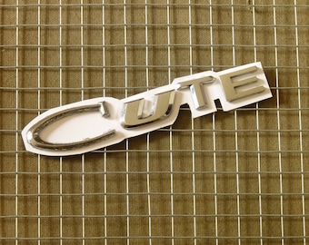 Repurposed Car Vehicle Letters - "CUTE" fridge magnet - metal plastic car letter - sayings words and slogans