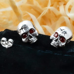 Silver Skull Stud Earrings: Gothic Punk Jewelry with Garnets