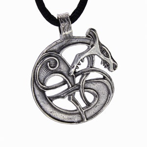 May include: Silver pendant necklace featuring a Celtic knot design with a wolf head. The wolf is curled around the knot, with its head facing to the right. The pendant is on a black cord.