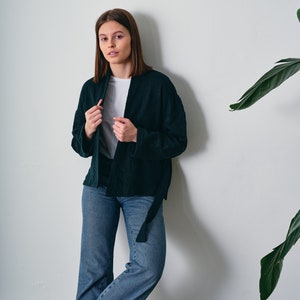 Belted Kimono Cardigan, a  versatile addition to your wardrobe. This open-front cardigan features a lightweight knitted design, perfect for a stylish and comfortable look. The oversized cotton jumper offering a fashionable and eco-friendly option.
