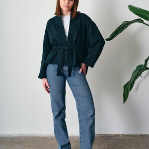 Belted Kimono Cardigan, a  versatile addition to your wardrobe. This open-front cardigan features a lightweight knitted design, perfect for a stylish and comfortable look. The oversized cotton jumper offering a fashionable and eco-friendly option.