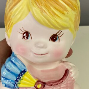 Vintage Child Pink Baby Planter Vase Head Vase Planter Baby Holding Train Pink & Blue Baby Blonde Hair Long Eyelashes image 2