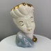 see more listings in the Vtg Head Vases/Planters section
