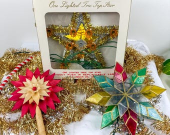 Adornos vintage en forma de estrella para la cima del árbol de Navidad, en una variedad de estilos, técnica mixta, se venden individualmente.