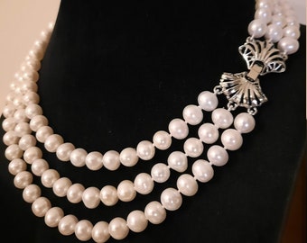 3 rangs de perles véritables de 9-10 mm sur le fermoir style boucle
