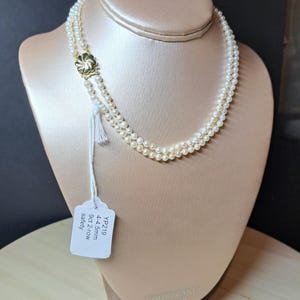 Pretty double row 4-4.5mm freshwater cultured pearl necklace on gold clasp