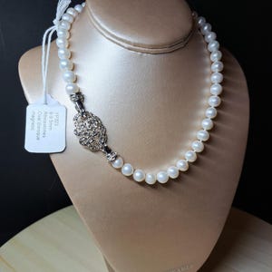 9-9.5mm genuine pearls on Rhinestone Oval Baroque clasp