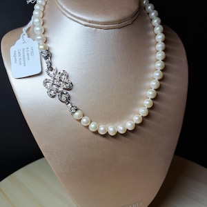 8.5-9mm genuine pearls on Rhinestone Knot clasp